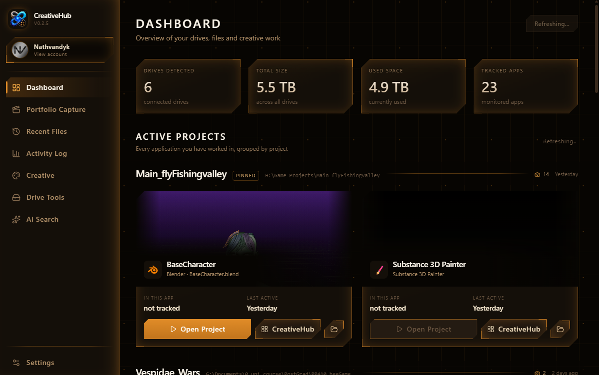 CreativeHub desktop dashboard showing drives, tracked apps, and active projects